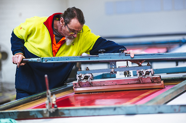 Person working on screen printing