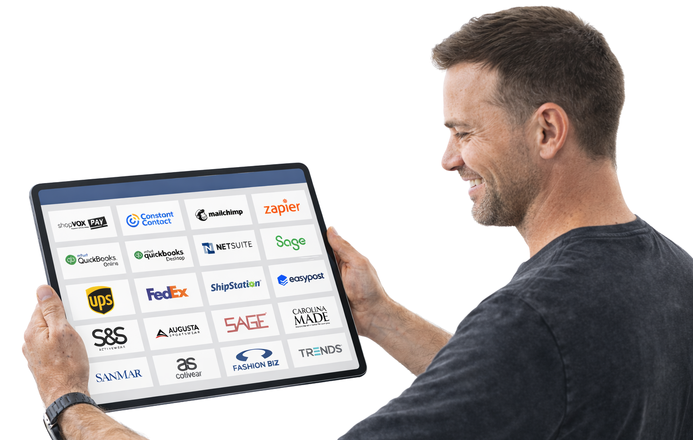 Man smiling and holding a smartphone displaying an app